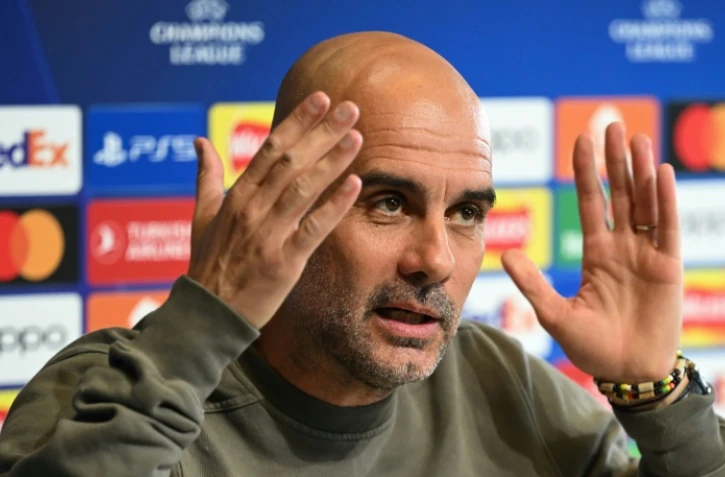 Pep Guardiola, l'entraîneur de Manchester City, en conférence de presse le 16 mai 2023 au centre d'entraînement du club à Manchester