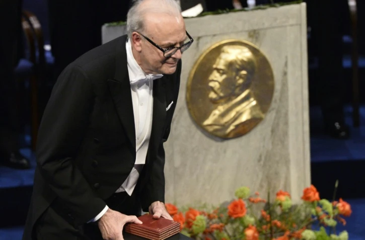 Le prix Nobel de littérature 2014, Patrick Modiano, recevant son prix le 10 décembre 2014 à Stockholm