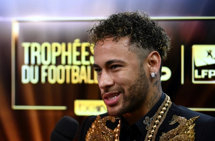 La star du PSG Neymar obtient la distinction suprême des Trophées UNFP, le 13 mars 2018 à Paris