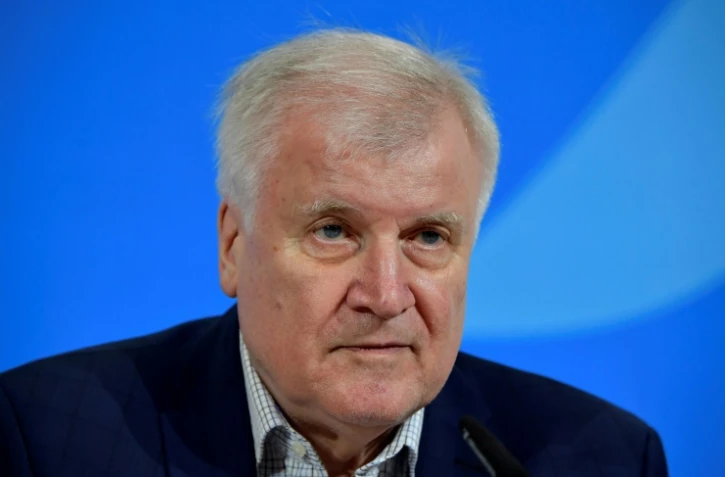 Le ministre allemand de l'Intérieur Horst Seehofer lors d'une conférence de presse à propos de mesures prises pour lutter contre le nouveau coronavirus, le 15 mars 2020 à Berlin.