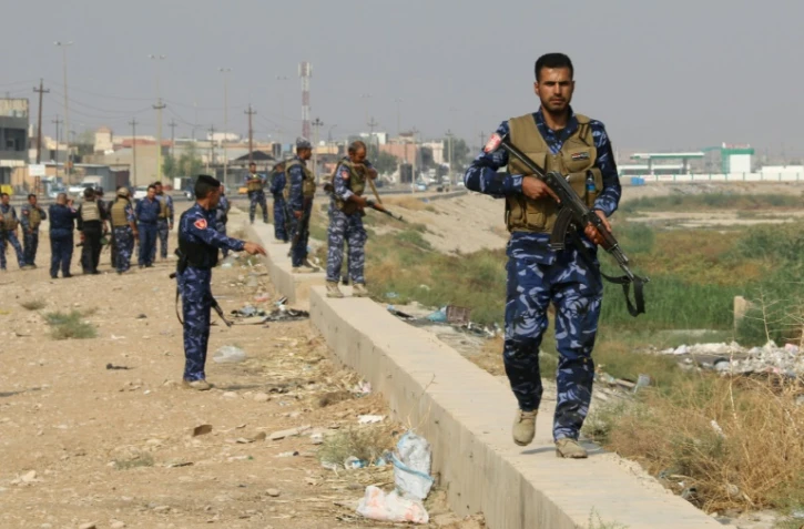 Des soldats des forces armées irakiennes patrouillent dans Kirkouk à la recherche de jihadistes du groupe Etat islamique, le 25 octobre 2016