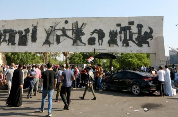 Des Irakiens se rassemblent sur la place Tahrir Ă Bagdad, le 26 octobre 2019
