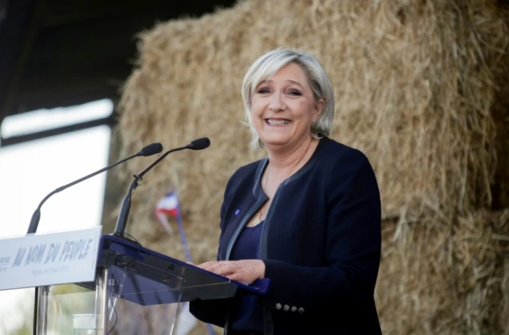 Marine Le Pen, candidate FN à la présidentielle, lors d'un meeting de campagne à la ferme Puybonnieux, à Pageas, le 13 avril 2017 près de Limoges