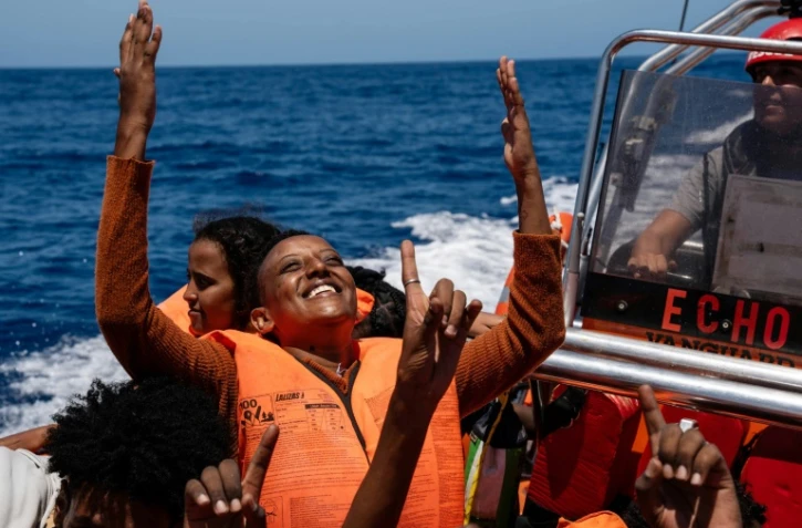 Des migrants secourus par l'ONG espagnole Proactiva Open Arms alors en Méditerranée au large des côtes libyennes le 3 août 2023