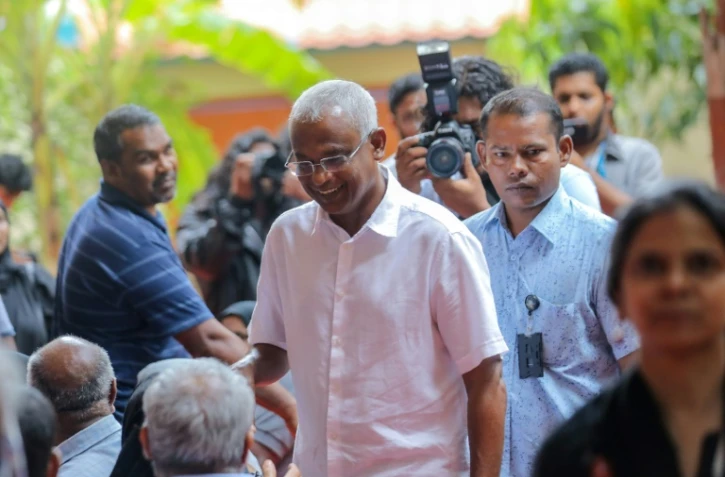 le candidat de l'opposition pour la présidentielle aux Maldives Ibrahim Mohamed Solih à son arrivée dans un bureau de vote à Male, le 23 septembre 2018