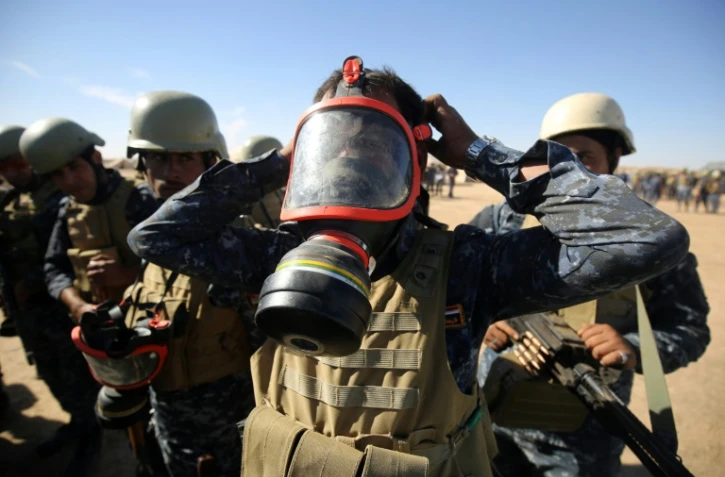 Des policiers irakiens se préparent à l'offensive pour reprendre Mossoul le 16 octobre 2016 à Qayyarah