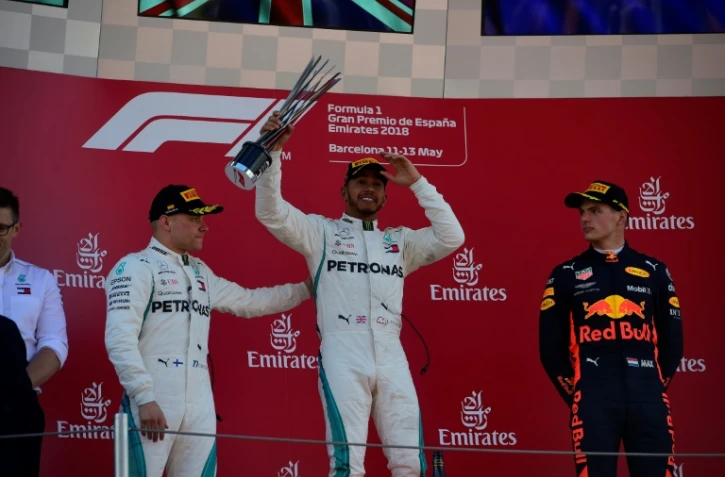Lewis Hamilton vainqueur du GP d'Espagne devant son coéquipier Valtteri Bottas et Max Verstappen sur le circuit de Montmelo, le 13 mai 2018 
