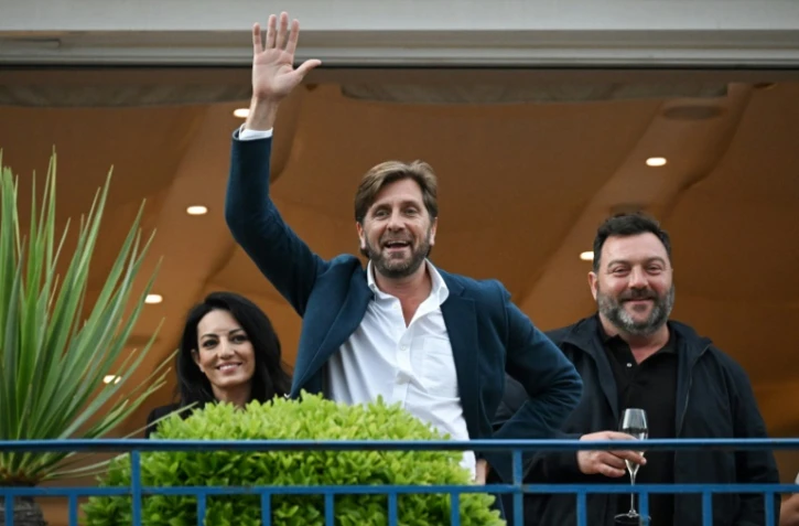 Le président du jury de la 76e Festival de Cannes Ruben Ostlund (C) et les membre du jury Maryam Touzani (G) et Dennis Menochet (D) la veille de la cérémonie d'ouverture à Cannes, le 15 mai 2023