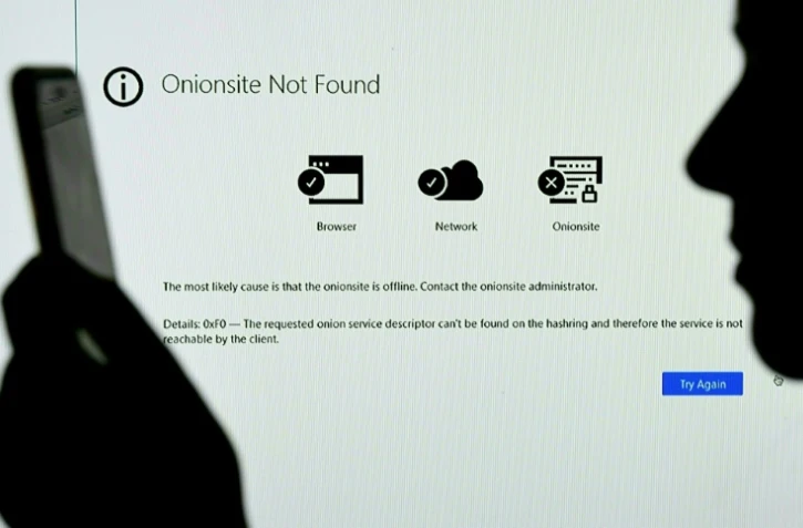 Un écran d'ordinateur montrant un site lié au rançongiciel ayant touché l'entreprise américaine Colonial Pipeline en mai 2021