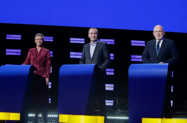 La Danoise Margrethe Vestager (libérale, Alde), l'Allemand Manfred Weber (droite pro-européenne, PPE) et le Néerlandais Frans Timmermans (social-démocrate, PSE), lors d'un débat à Bruxelles le 15 mai 2019