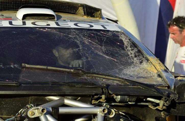 Sébastien Loeb à son arrivée au bivouac à l'issue de la 8e étape du Dakar le 11 janvier 2016 entre Salta et Belen en Argentine