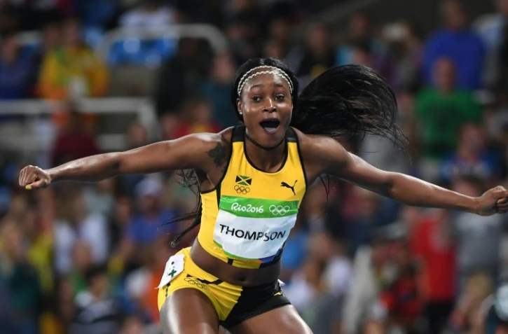 Elaine Thompson euphorique après sa victoire en finale du 100 m des JO de Rio, le 13 août 2016