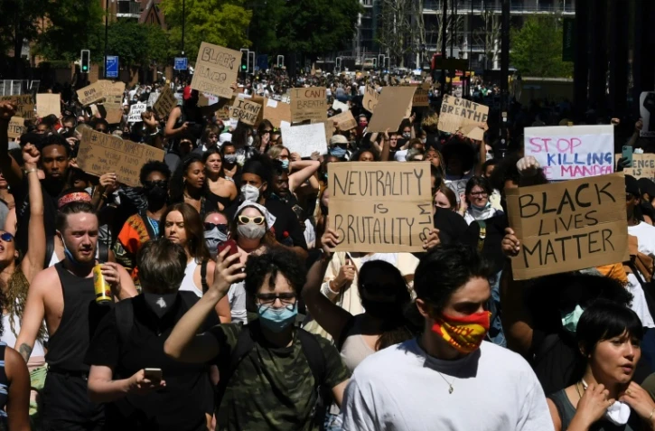 Des centaines de personnes manifestent, le 31 mai 2020, à Londres pour protester contre la mort aux Etats-Unis d'un Afro-américain de 46 ans, George Floyd, après avoir été arrêté par la police
