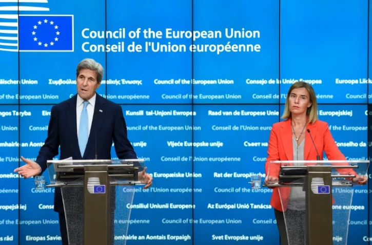 Le secrétaire d'Etat américain John Kerry et la chef de la diplomatie européenne Federica Mogherini à Bruxelles le 18 juillet 2016