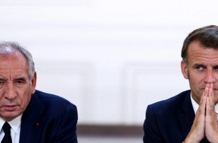 François Bayrou et le président Emmanuel Macron, le 12 juillet 2025 à l'Elysée, à Paris