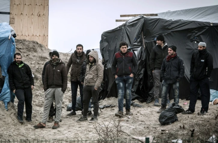 Des migrants dans la "jungle" de Calais, le 21 février 2016