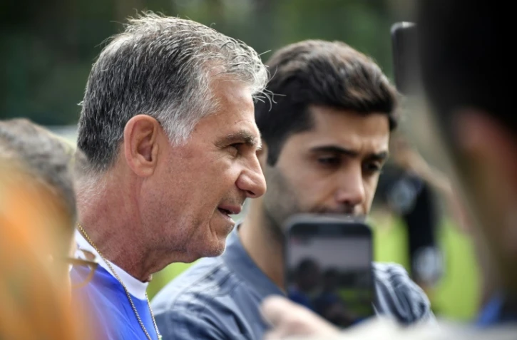 L'entraîneur portugais de l'équipe d'Iran Carlos Queiroz répond aux questions des journalistes durant une séance d'entraînement, le 23 juin 2018 à Bakovka