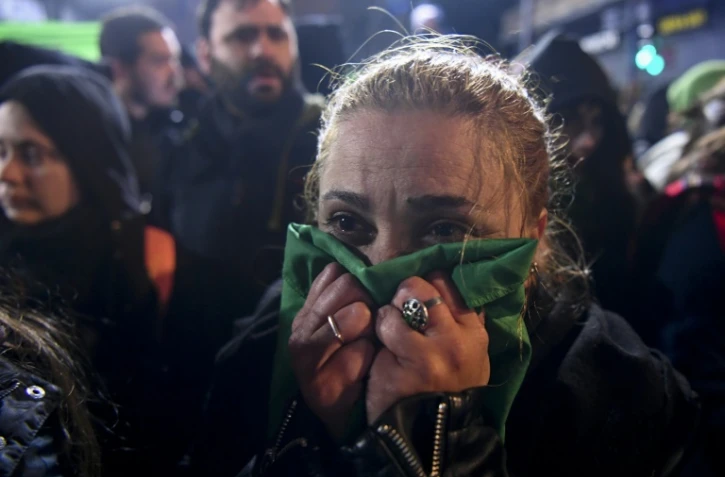 Une militante pro-IVG réagit devant le Congrès à Buenos Aires, le 9 août 2018, après le rejet par le Sénat argentin du projet de loi sur la légalisation de l'avortement