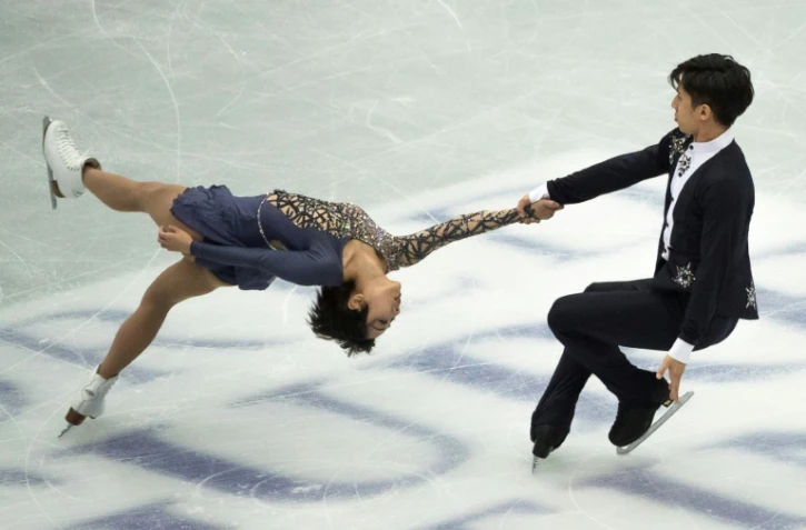 Le couple chinois Wenjing Sui (g) et Cong Han lors du programme court des Mondiaux de patinage artistique, le 20 mars 2019 à Saitama