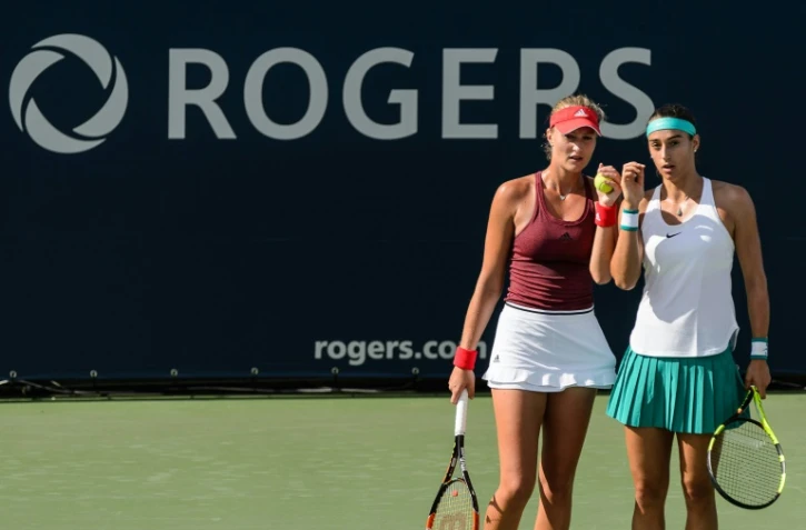 Kristina Mladenovic et Caroline Garcia lors du tournoi WTA de Montréal, le 29 juillet 2016