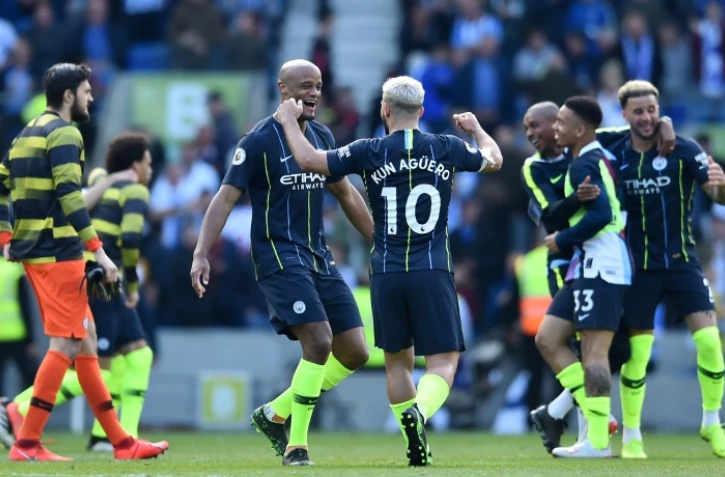 Les joueurs de Manchester City en liesse après avoir décroché le sacre de champion d'Angleterre à l'issue du match victorieux à Brighton, le 12 mai 2019