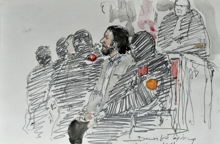 Un croquis d'audience représente Salah Abdeslam, attendant le début de son procès au Palais de Justice de Bruxelles, le 5 février 2018
