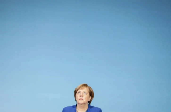 La chancelière allemande Angela Merkel lors d'une conférence de presse à Berlin le 12 janvier 2018