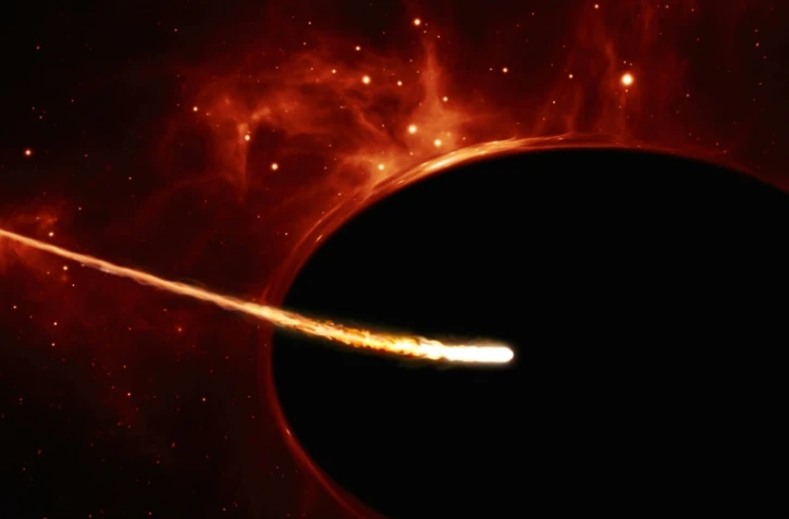 Représentation d'une étoile attirée par un trou noir, diffusée le 9 décembre 2016 par l'Agence spatiale européenne