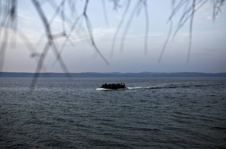Des migrants arrivent sur les côtes de l'île grecque de Lesbos après avoir traversé la mer Egée depuis la Turquie, le 10 septembre 2015