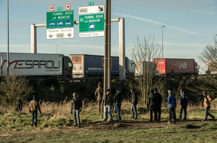 Des migrants le 21 janvier 2016 à Coquelles près de Calais 