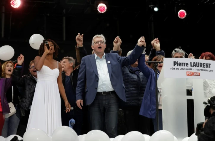 Le secrétaire national du PCF, Pierre Laurent (c), le 17 septembre 2017 à la Fête de l'Humanité, à La Courneuve près de Paris