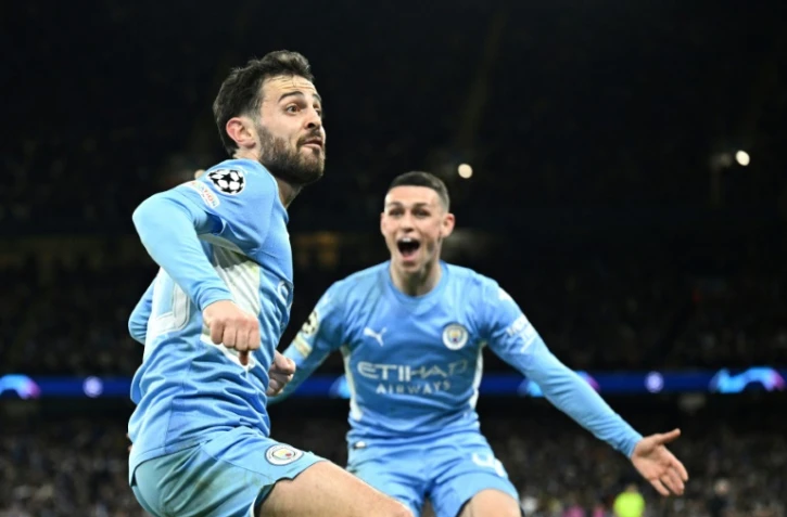 La joie du milieu de terrain portugais Bernardo Silva, après avoir marqué le 4e but pour Manchester City face au Real Madrid, lors de leur demi-finale aller de la Ligue des Champions, le 26 avril 2022 à l'Etihad Stadium