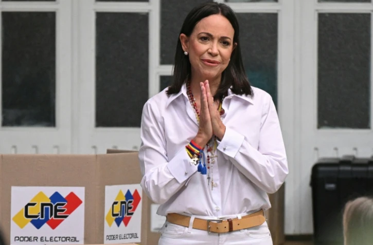 La cheffe de l'opposition au Venezuela, Maria Corina Machado, dans un bureau de vote lors de l'élection présidentielle, à Caracas, le 28 juillet 2024