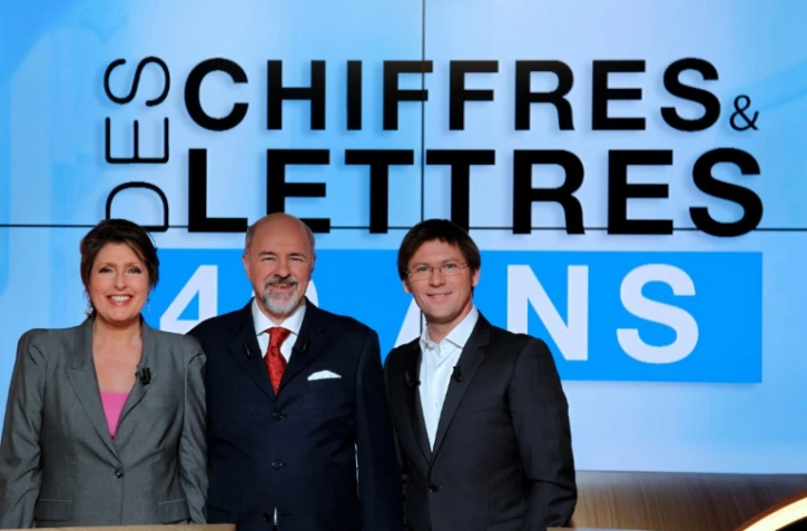 Les animateurs "Des chiffres et des Lettres"  Arielle Boulin-Prat, Bertrand Renard et Laurent Romejko (G à D) au siège de France Télévision à Paris, le 16 février 2012