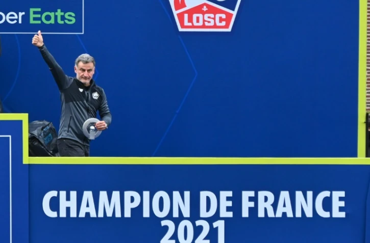 L'entraîneur de Lille, Christophe Galtier, fête le titre de champion de France à l'issue du match à Angers, le 23 mai 2021