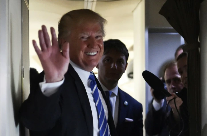 Le président américain Donald Trump, le 5 avril 2018 à bord de l'avion présidentiel Air Froce One à Washington
