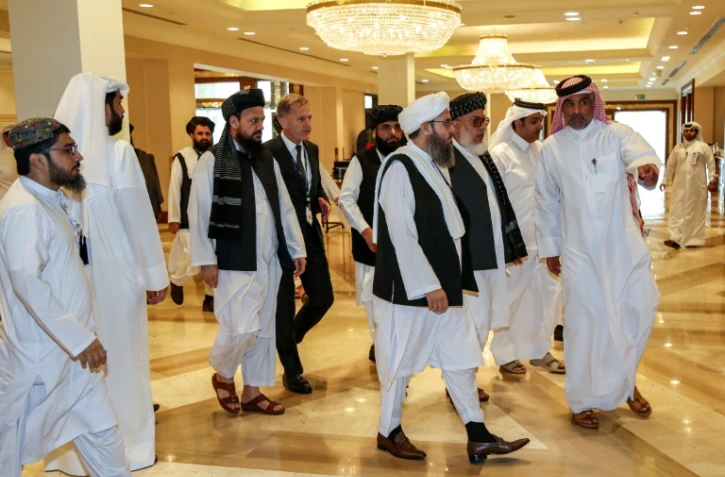 Des membres des talibans s'apprêtent à participer au dialogue avec des responsables afghans à Doha, le 7 juillet 2019