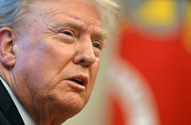 Le président américain Donald Trump dans le Bureau ovale de la Maison Blanche à Washington, le 25 février 2025