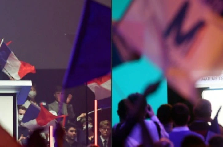 Combo photo réalisé le 7 février 2022 montrant les candidats à l'élection présidentielle Eric Zemmour (G) à Lille et Marine Le Pen à Reims dans des meetings de campagne le 5 février