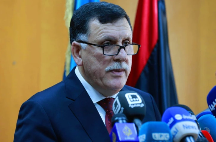 Le chef du gouvernement d'union nationale libyen, Fayez al-Sarraj, lors d'une conférence de presse à son arrivée le 30 mars 2016 à Tripoli