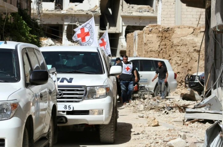 Un convoi d'aide humanitaire à son  arrivée le 1er juin 2016 à Daraya 