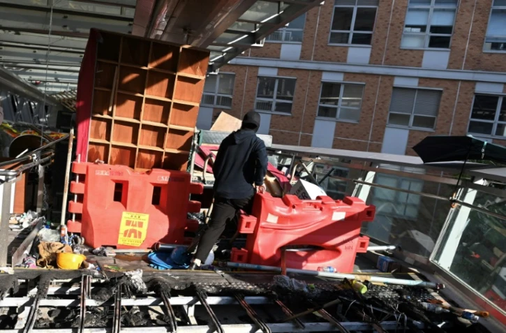 Un des derniers militants pro-démocratie occupant encore l'Université Polytechnique de Hong Kong, le 22 novembre 2019