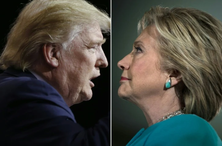 Montage réalisé le 7 novembre  2016 du candidat républicain à présidentielle américaine Donald Trump à Cleveland (Ohio) le 22 octobre 2016 et de sa rivale démocrate Hillary Clinton à Manchester (New Hampshire) le 6 novembre 2016