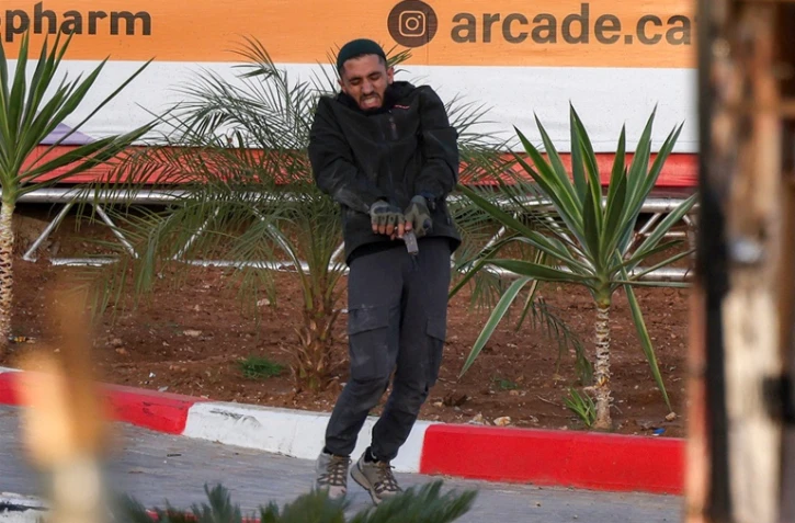 Un des deux assaillants palestiniens armés durant une fusillade avec des soldats israéliens près de Hébron, qui a fait cinq blessés, en Cisjordanie occupée, le 23 octobre 2026