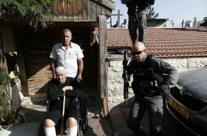 La police israélienne expulse des membres de la famille Shamasneh de la maison qu'ils occupent depuis 50 à Jérusalem-Est, le 5 septembre 2017