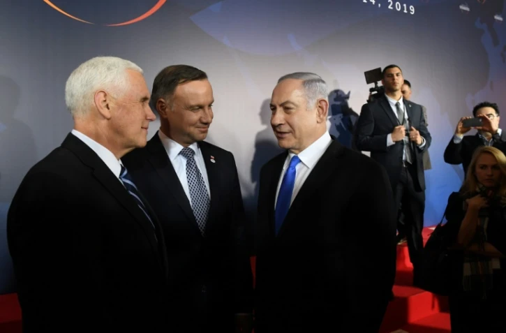 Le vice-président américain Mike Pence (g), le président polonais Andrzej Duda (c) et le Premier ministre israélien Benjamin Netanyahu, le 13 février 2019 à Varsovie