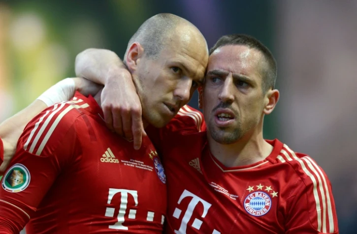 Les joueurs du Bayern Munich Franck Ribéry et Arjen Robben lors de la victoire à domicile 5-1 face à Francfort en dernière journée du championnat d'Allemagne le 18 mai 2019
