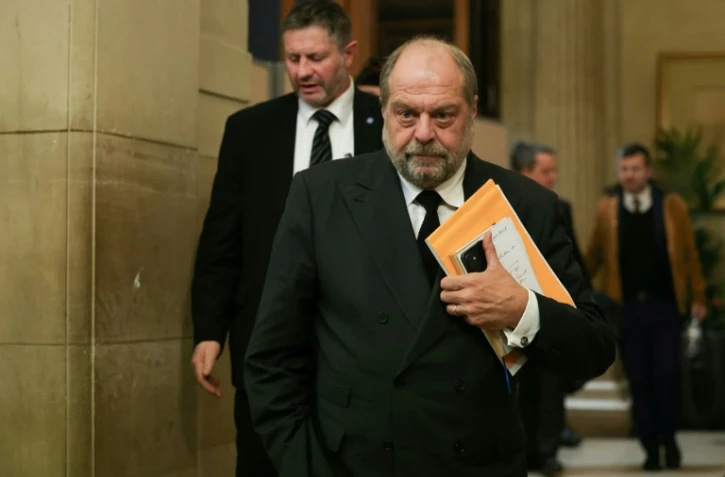 Le garde des Sceaux Eric Dupond-Moretti (C) au palais de justice de Paris le 15 novembre 2023