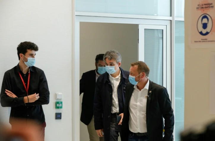 Le directeur de la publication de Charlie Hebdo, Laurent Sourisseau (C) alias Riss, au palais de justice de Paris, le 9 septembre 2020 