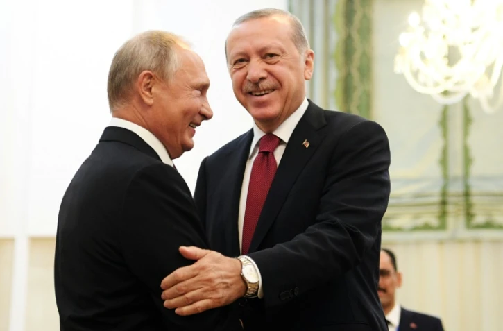 Le président russe Vladimir Poutine (g) et son homologue turc Recep Tayyip Erdogan, le 7 septembre 2018 à Téhéran